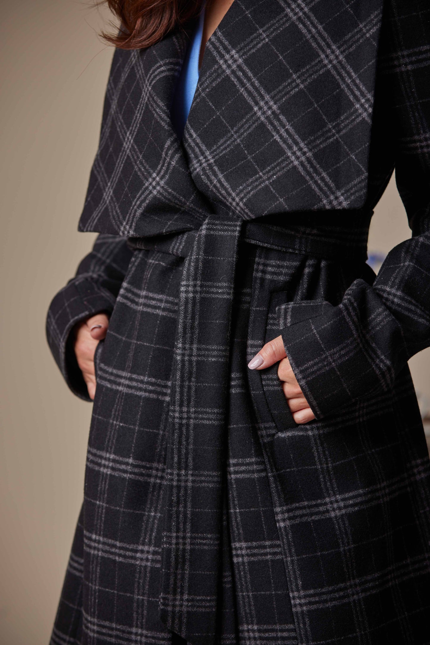 Plaid coat with a focus on the fabric and pattern